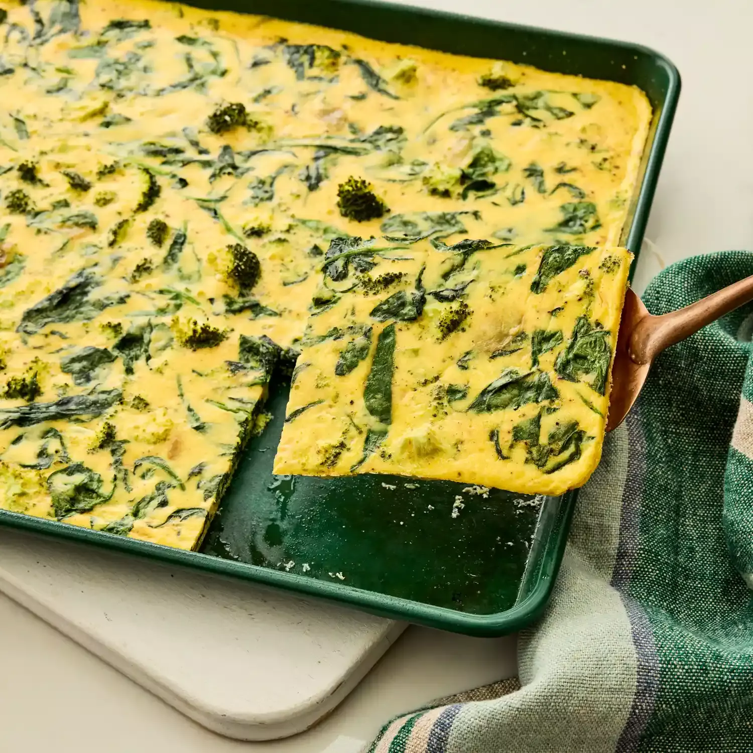 Crowd-Pleasing Spinach, Broccoli, and Parmesan Quiche