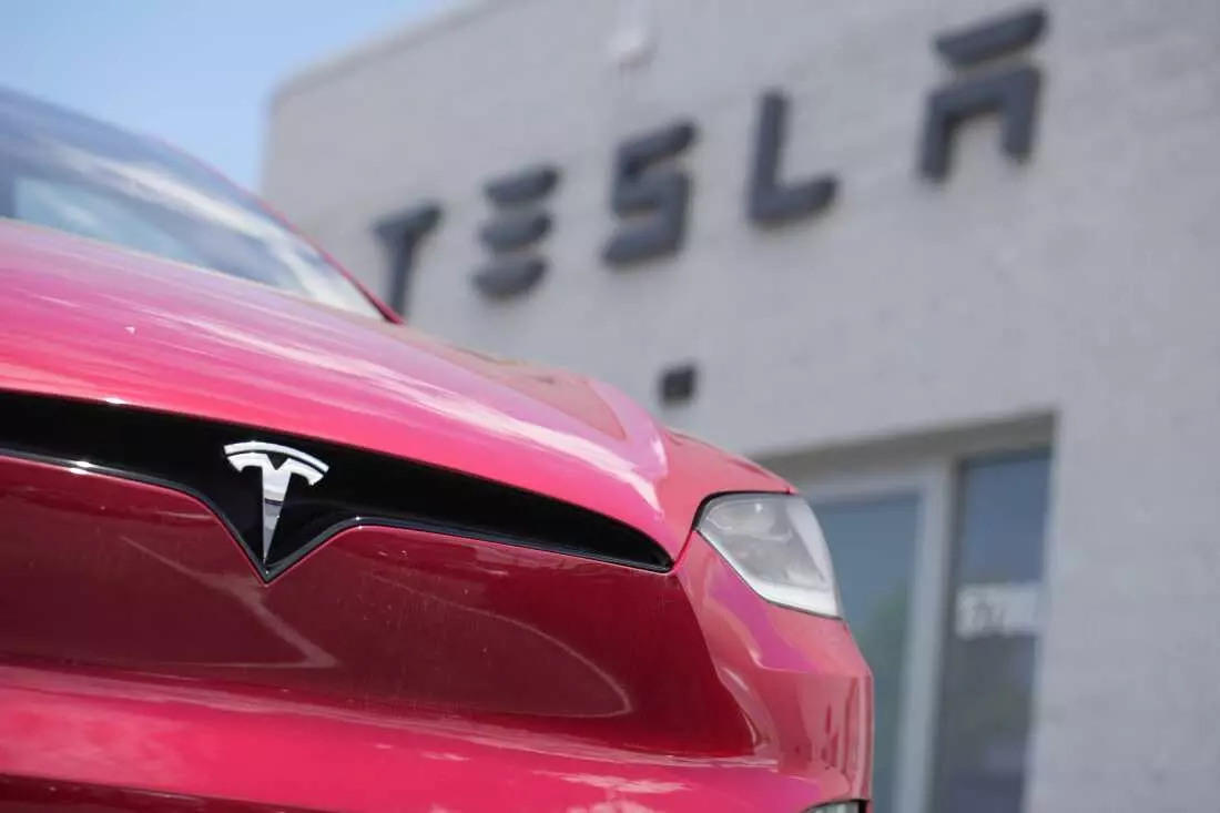 Tesla's Shifting Strategy: From EV Leader to AI and Robotics Pioneer Amidst Profit Slump
