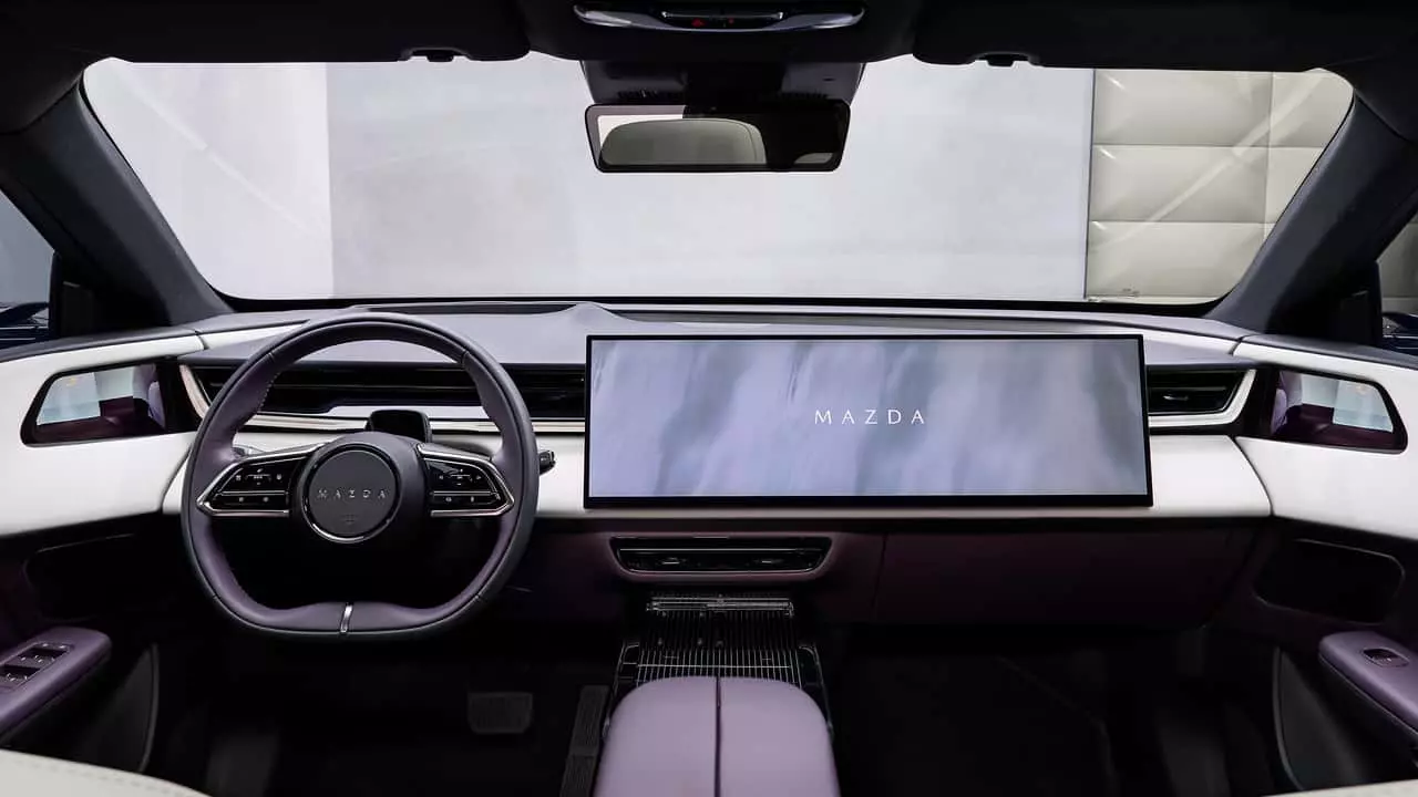 Mazda Defends Large In-Car Screens, Prioritizing Driver Focus with Head-Up Displays