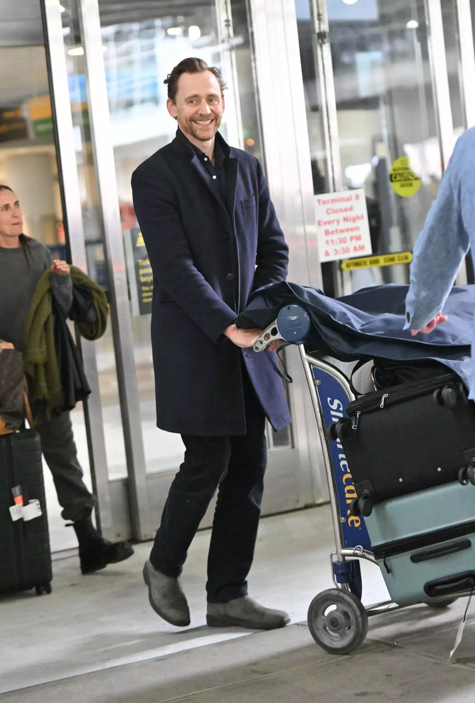 Tom Hiddleston's Impeccable Airport Style