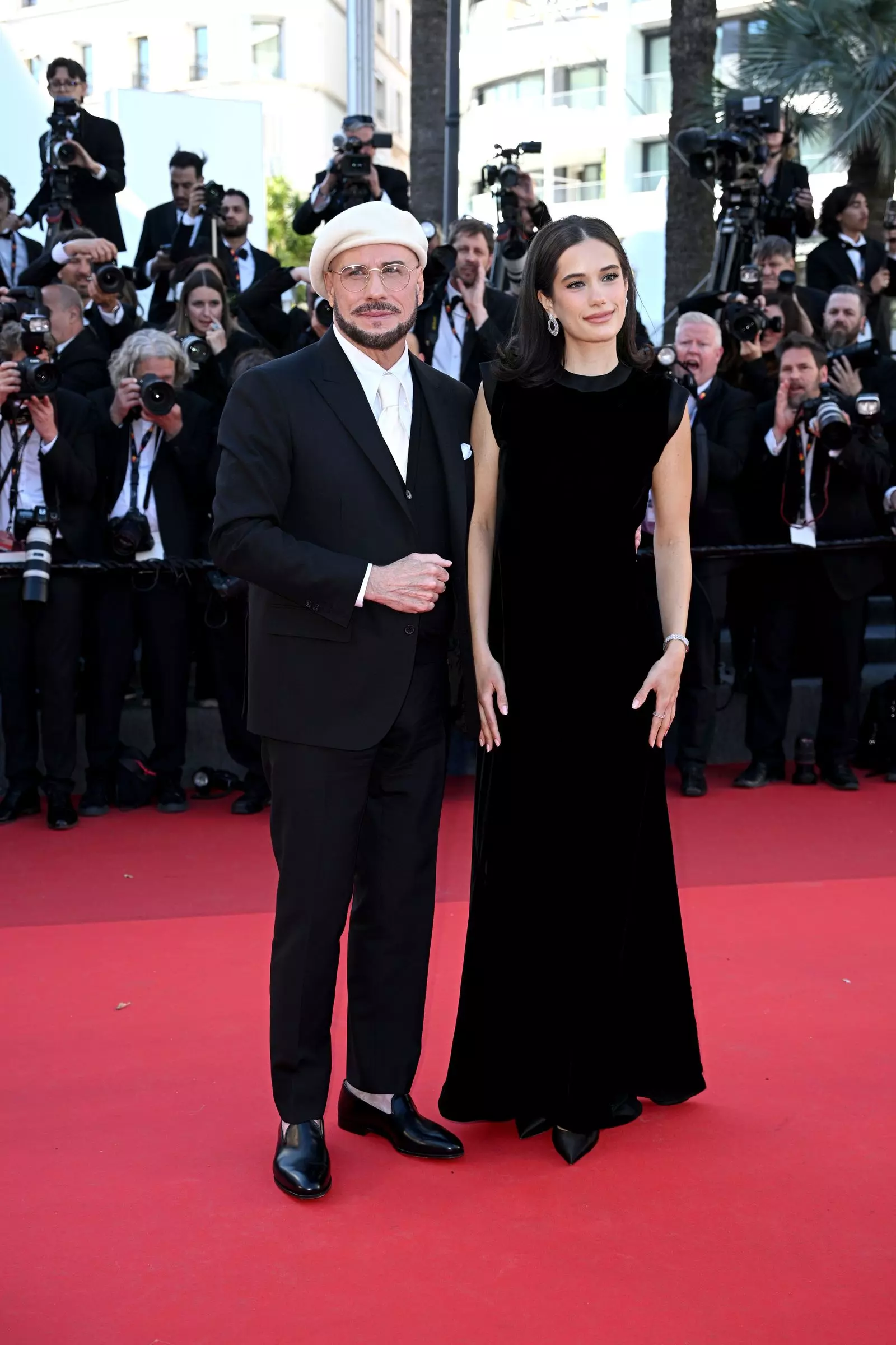John Travolta's Cannes Style Evolution: From Acting Icon to Beret-Clad Director