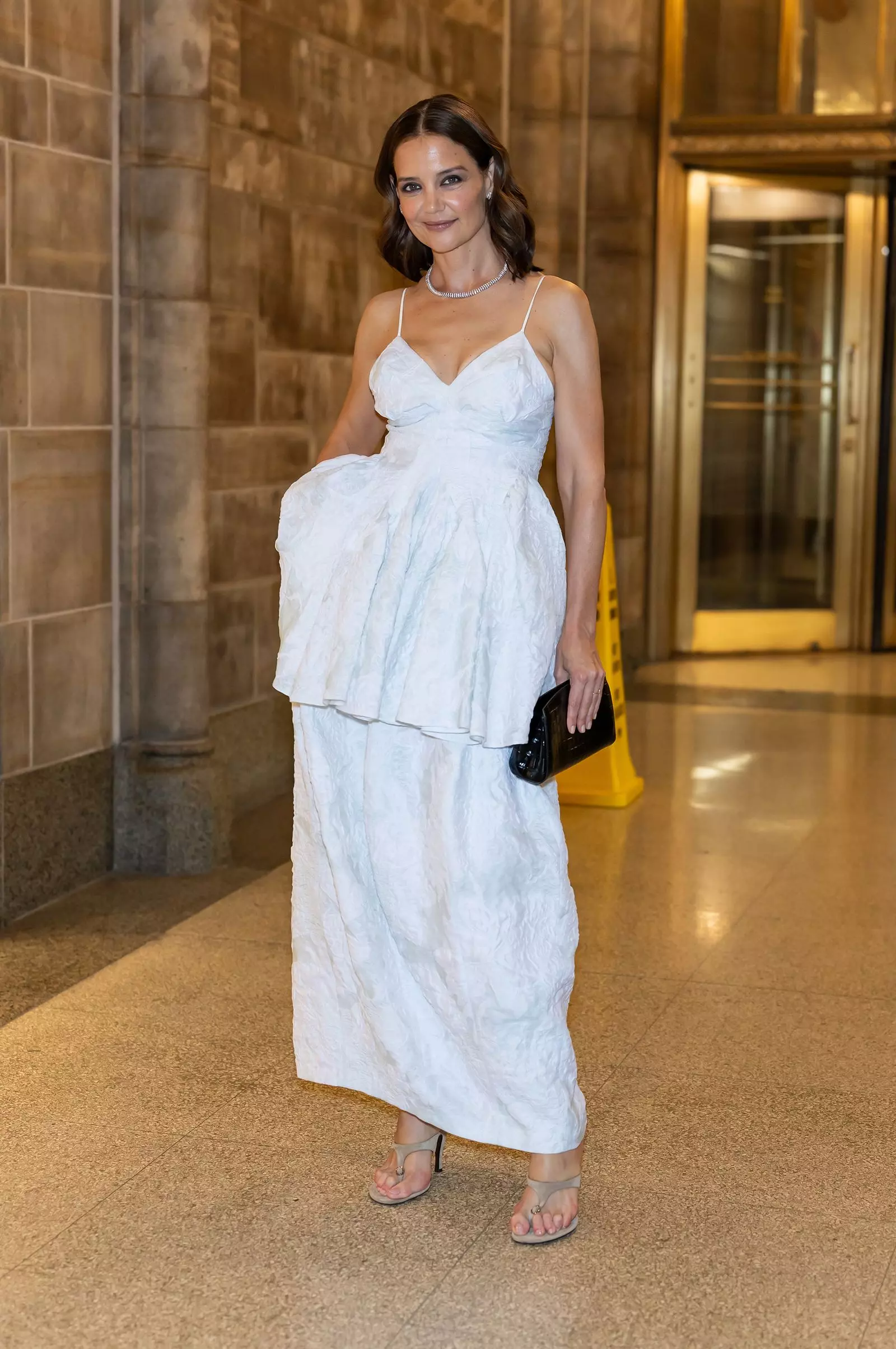 Katie Holmes Embraces the '90s Thong Sandal Trend with Sophistication