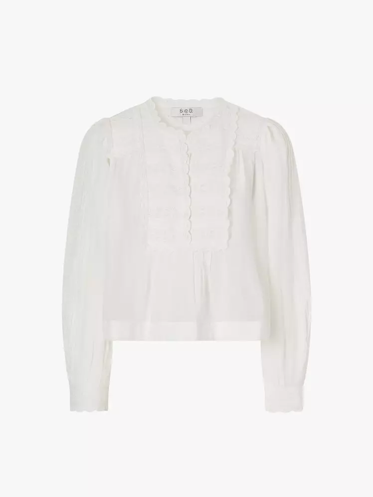 The Billowy White Top: Your Ultimate Summer Style Essential