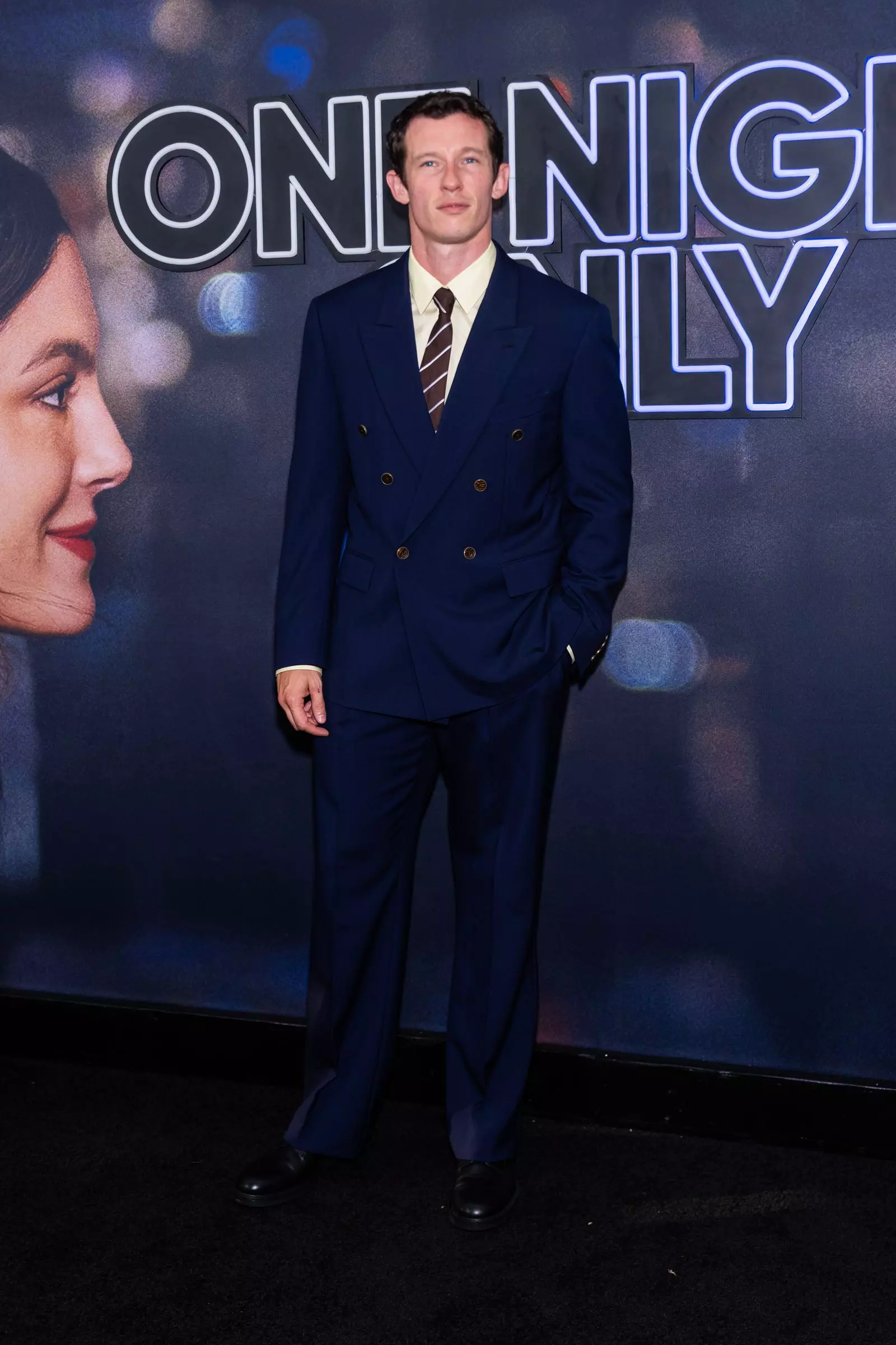 Callum Turner's Stylish Twist on the Classic Navy Suit
