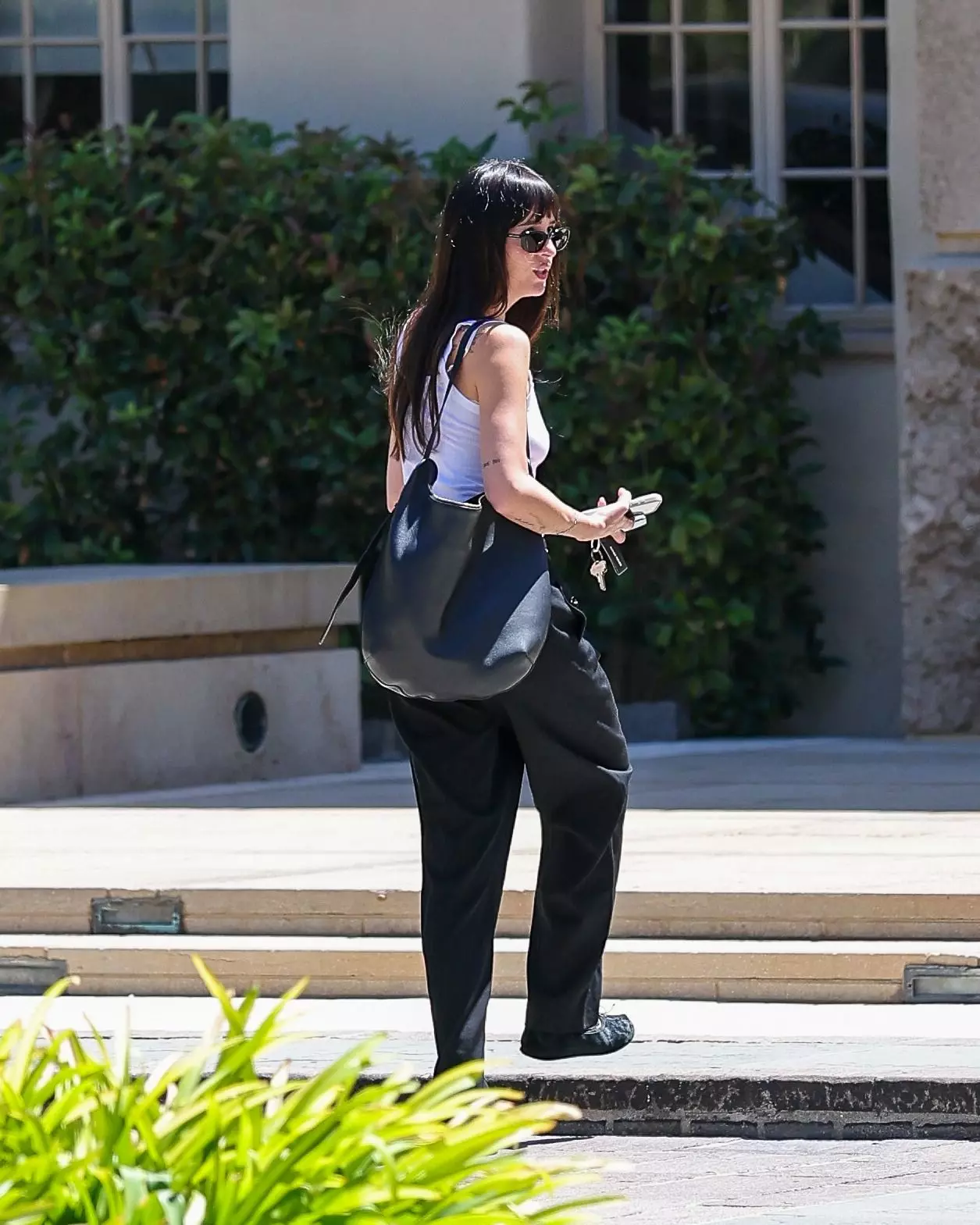 Dakota Johnson Embraces Autumn with a Chic "Glossed Espresso" Hair Transformation