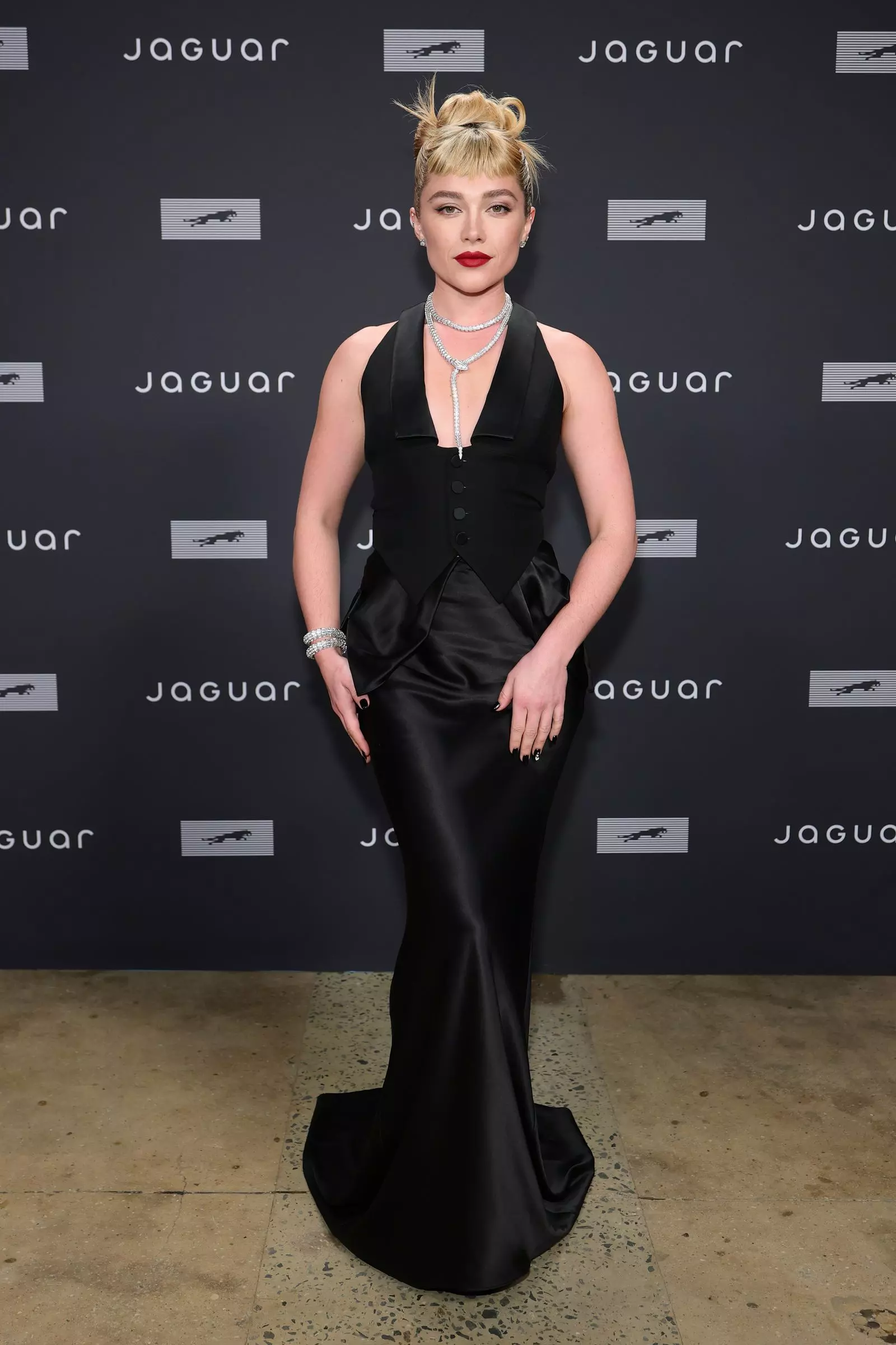 Florence Pugh's Bold Bangs Make a Statement at Jaguar Type 01 Premiere