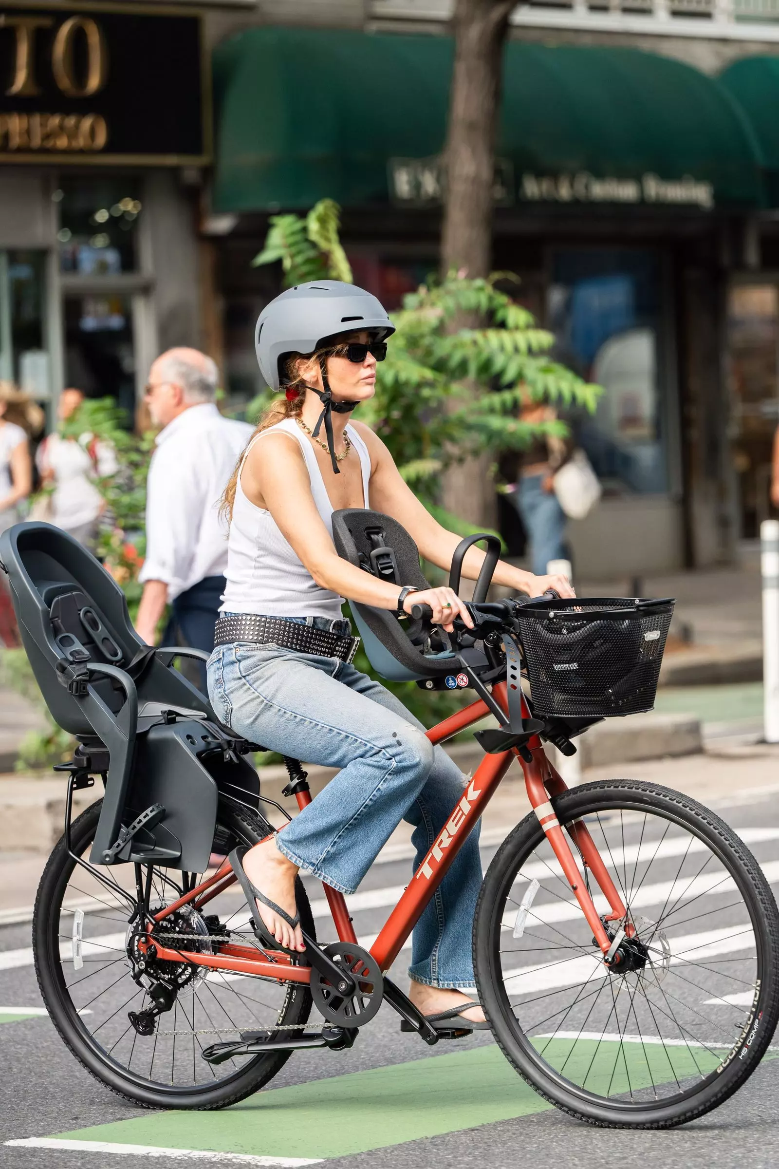 Jennifer Lawrence's Bold Style Statement: Oversized Belt and Bicycle Safety